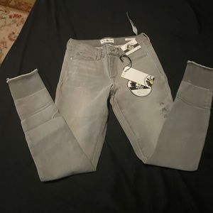 Gray jeans skinny true to size (3/26). Distressed bottom. Classy or Loungey